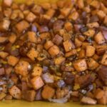 Roasted sweet potato hash with onions, garlic, shallots, and fresh parsley