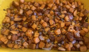Roasted sweet potato hash with onions, garlic, shallots, and fresh parsley